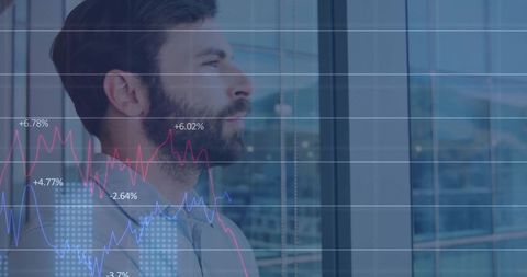 caucasian businessman contemplating financial data visualization - Download Free Stock Images Pikwizard.com