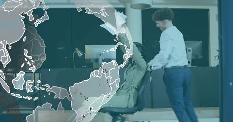 Office team shielding colleague during emergency drill with global risk overlay