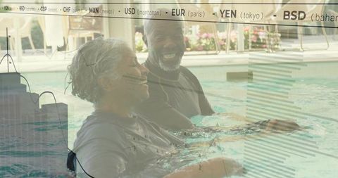 Senior adults enjoying luxurious pool conversation outdoors