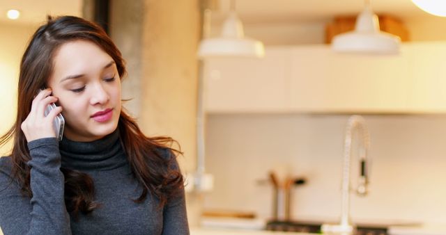 Woman Talking on Phone in Modern Kitchen - Download Free Stock Images Pikwizard.com