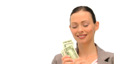 Smiling Woman Holding Cash on Isolated White Background