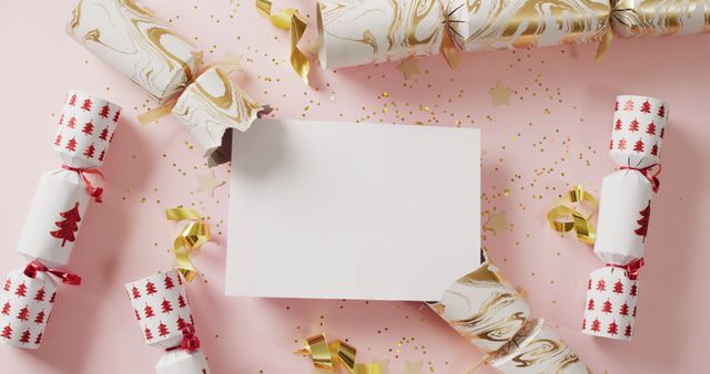 Festive Christmas Crackers with Blank Card on Pink Background - Download Free Stock Images Pikwizard.com