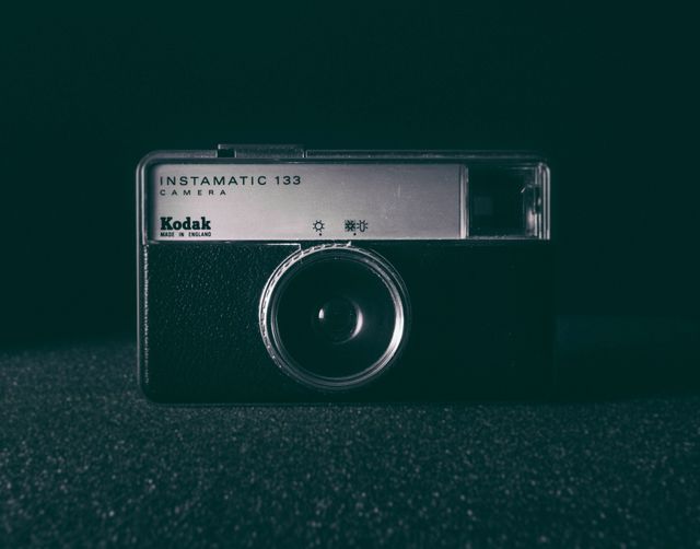 Retro Kodak Instamatic 133 Camera on Dark Background - Download Free Stock Photos Pikwizard.com
