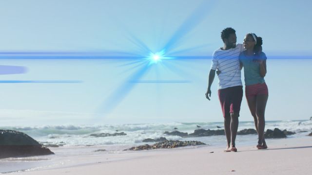 African American couple walking along a beautiful beach with animated light trails in the background. This video exudes romance, leisure, and adventure. Suitable for use in campaigns related to vacation destinations, romantic getaways, digital animations, or lifestyle blogs focused on travel and relationships.