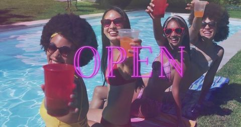 Women Enjoying Poolside Leisure in Colorful Summer Bikinis