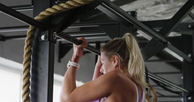 Fit Woman Performing Pull Ups in Gym - Download Free Stock Images Pikwizard.com