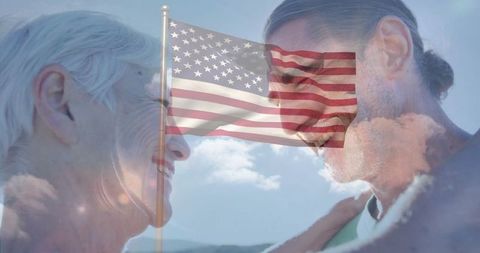 Senior woman and son bonding outdoors with american flag overlay