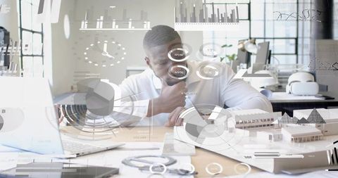 Architect Analyzing Data Integration in High-Tech Office Environment