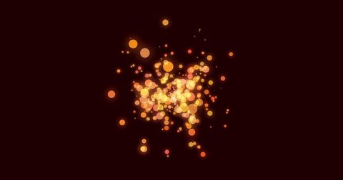 Vibrant effervescent orange and yellow circles on dark background