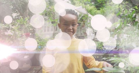 Smiling Child Enjoying Garden with Bright Camera Effects