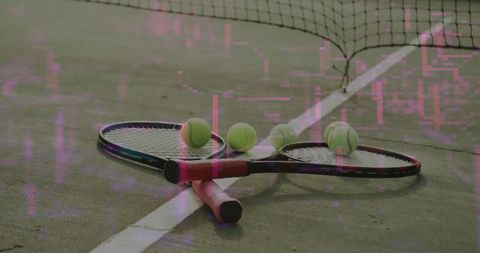Tennis rackets and balls on court with tech overlay