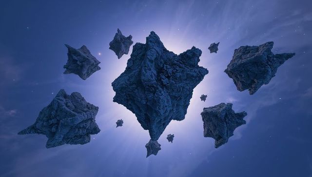 Drifting jagged asteroids casting radiant halo backlit by nebula haze in deep space