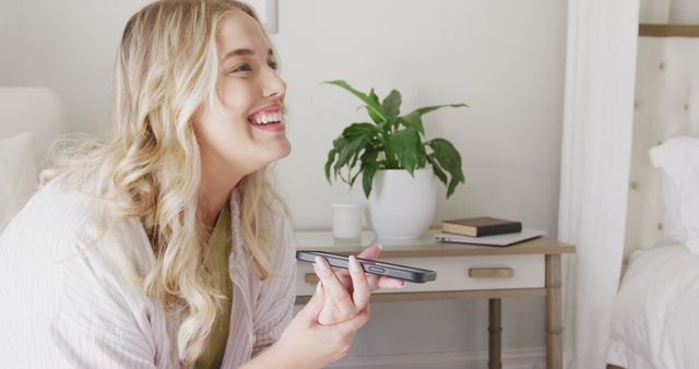 Happy Blonde Woman Using Voice Assistant on Smartphone - Download Free Stock Images Pikwizard.com