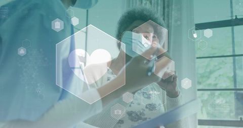 Senior woman holding inhaler consulting masked provider tapping tablet with heart hex ui