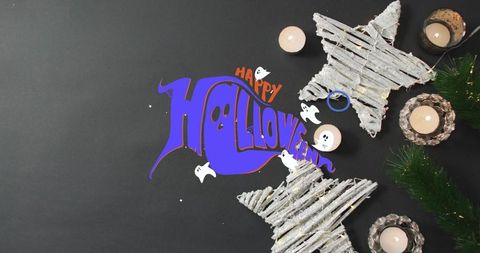 Festive Halloween Sign with Lit Candles and Wooden Stars