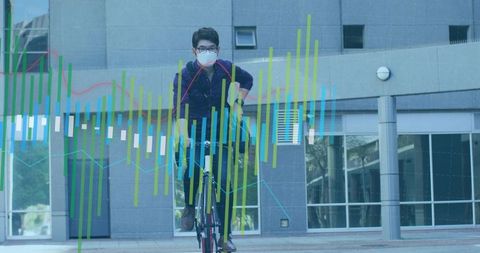 Masked urban cyclist commuting and pedaling through corporate plaza with colorful data overlay
