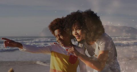 Mother and Son Bonding During Scenic Beach Adventure