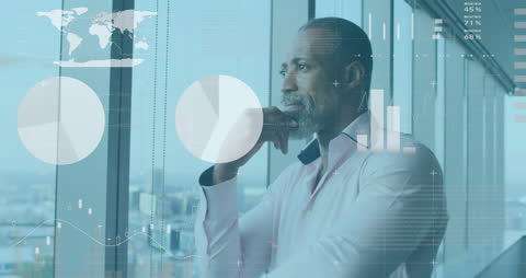 Thoughtful Businessman Analyzing Financial Data in Modern Office