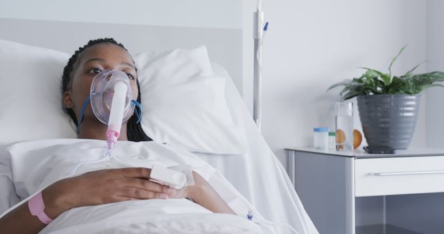 Young Woman Receiving Oxygen Therapy in Hospital Bed - Download Free Stock Images Pikwizard.com