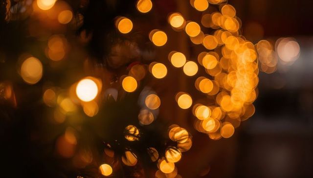 Warm golden bokeh lights creating festive twinkling garland ambience