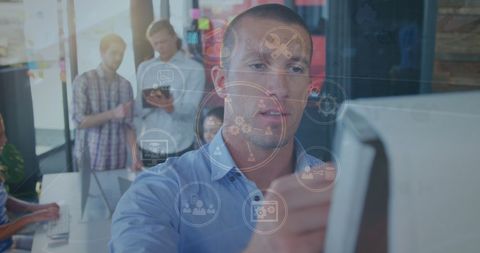 Businessman interacting with virtual interface in office setting