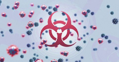 Biohazard symbol with covid-19 viruses floating
