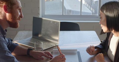 Collaborative Business Meeting at Office Table