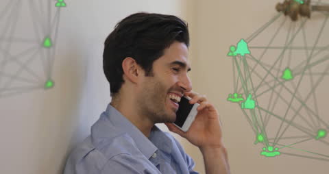 Smiling Man Communicatin with Smartphone and Digital Overlay