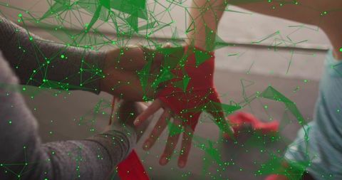Wrapping hands for boxing training with red hand wraps and green digital network overlay