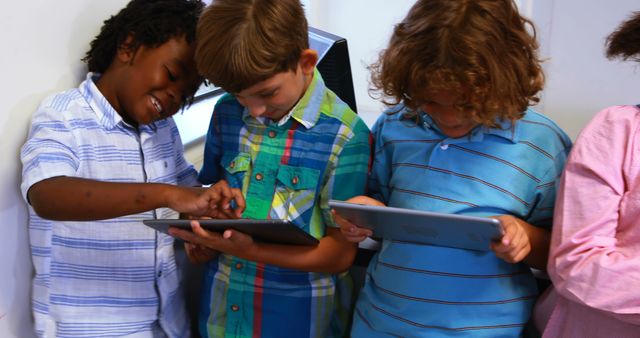 Diverse Group of Kids Using Tablets for Learning - Download Free Stock Images Pikwizard.com