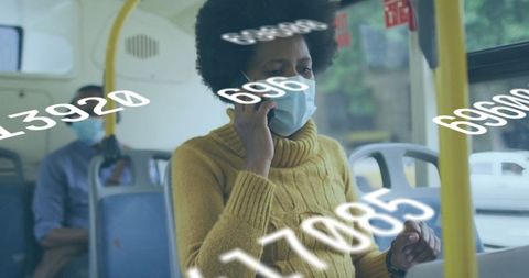 African american woman balancing virtual work on public bus