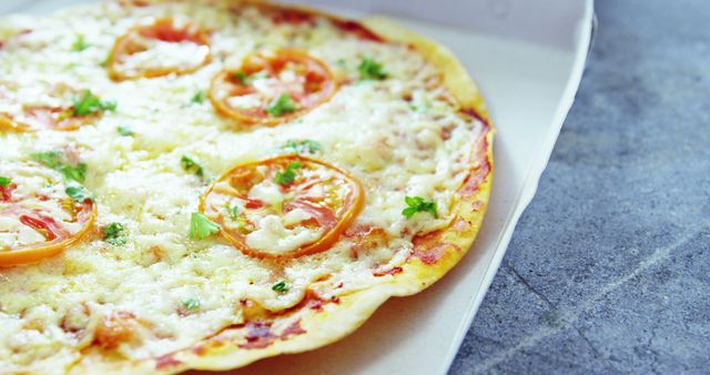 Close-Up of Delicious Cheese and Tomato Pizza with Fresh Parsley Garnish - Download Free Stock Images Pikwizard.com
