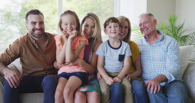 Happy Multi-Generational Family Smiling at Home - Download Free Stock Images Pikwizard.com