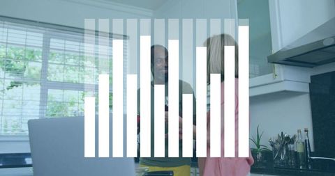 Couple Joyfully Cooking Together in Modern Home Kitchen