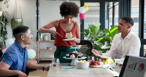 Joyful Businesswoman Hosting Farewell Office Party with Cake