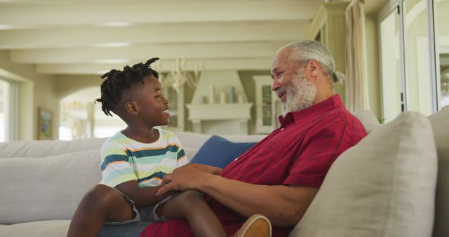 Grandfather and Grandson Smiling and Sharing a Tender Moment at Home - Download Free Stock Images Pikwizard.com