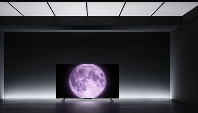 Displaying purple full moon on large tv in minimalist led-lit modern showroom