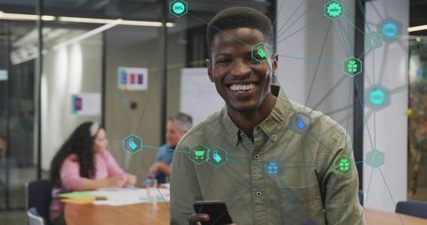 Smiling Professional with Smartphone in Modern Conference RoomTech Icons