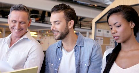 Diverse Professionals Collaborating on Work Project