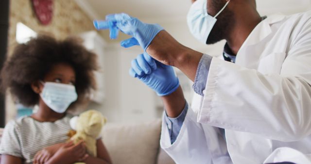 Pediatrician Preparing Examination With Young Patient in Mask - Download Free Stock Images Pikwizard.com