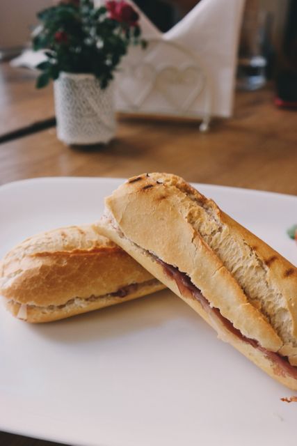 Two Fresh Baguettes with Ham on White Plate - Download Free Stock Images Pikwizard.com