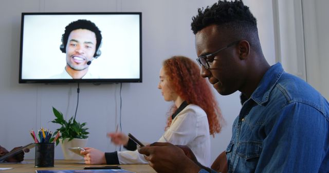 Diverse Colleagues Engaging in Video Conference Meeting - Download Free Stock Images Pikwizard.com