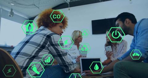 Innovative Team Collaborating with Sustainability Focus in Modern Office