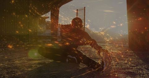 Urban Street Performer Creating Luminous Light Trails at Dusk