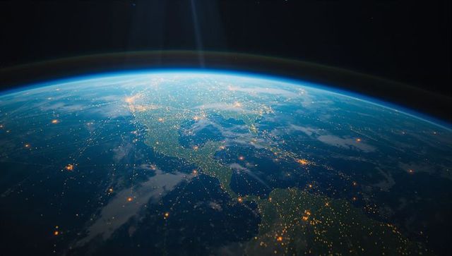 Earth from Space with Glowing Night Lights and Atmosphere
