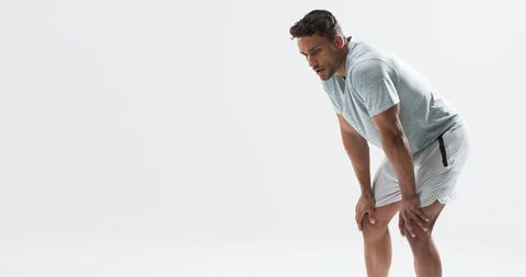 Athletic man exhausted after intense workout