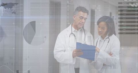 Doctors Analyzing Data with Digital Interface in Medical Environment