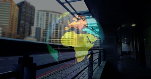 Futuristic Transparent Globe Overlaid on Urban Cityscape