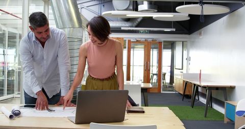 Collaboration Over Blueprint in Modern Office Space - Download Free Stock Images Pikwizard.com