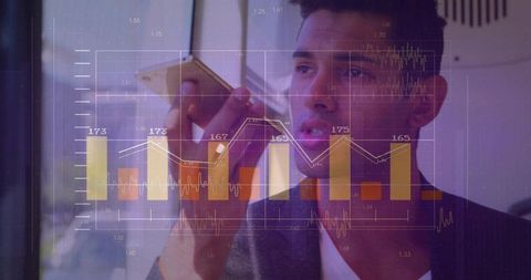 Businessman dictating information with overlaid data charts